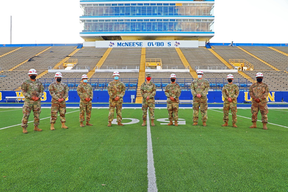 249th Engineer Battalion Prime Power Soldiers pose at McNeese State's Cowboy Stadium