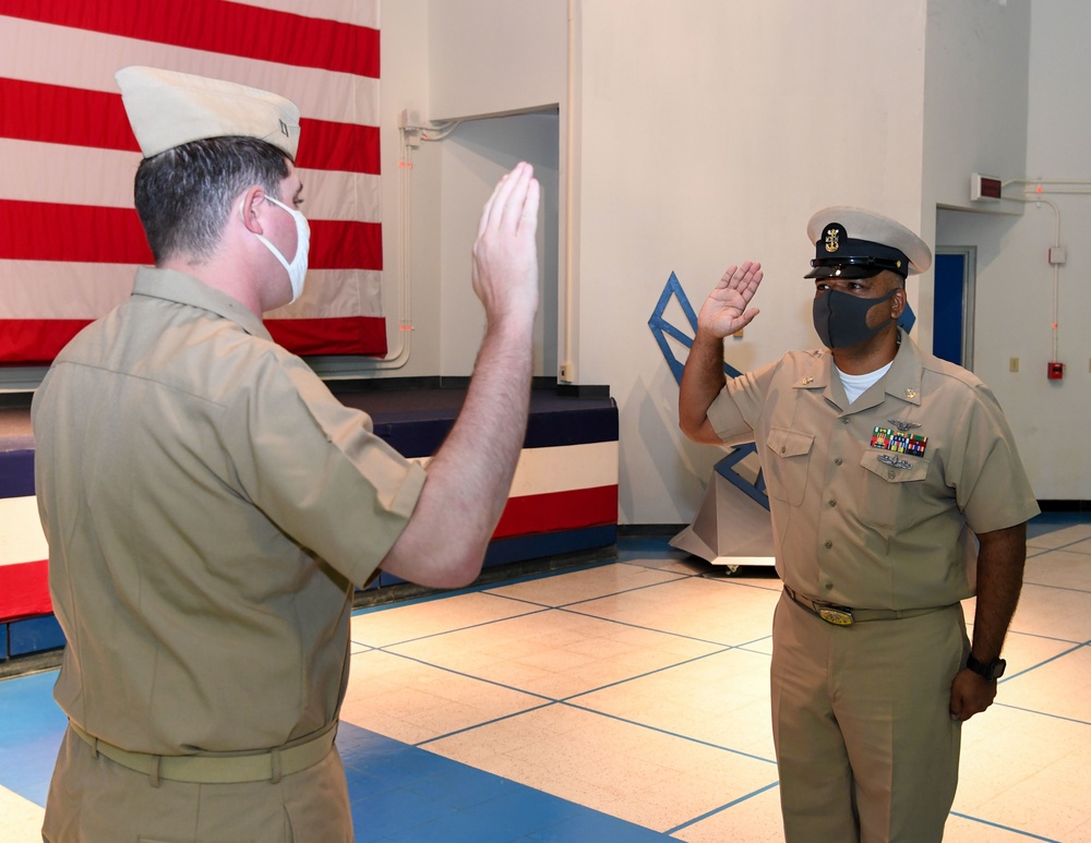 Master Chief Aviation Boatswain’s Mate (handling) Charles Bringuez Reenlistment Ceremony