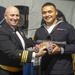 Airman Yummy Soaia (right) assigned to USS Constitution, is awarded Blue Jacket of the Year by the 76th commanding officer of USS Constitution, Cmdr. John A. Benda (left)