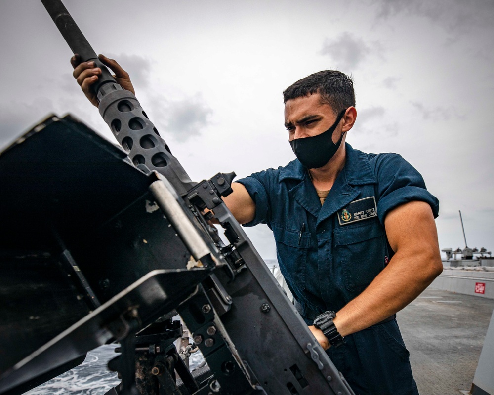 Sailors conduct daily maintenance aboard McCain
