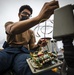Sailors conduct daily maintenance aboard McCain