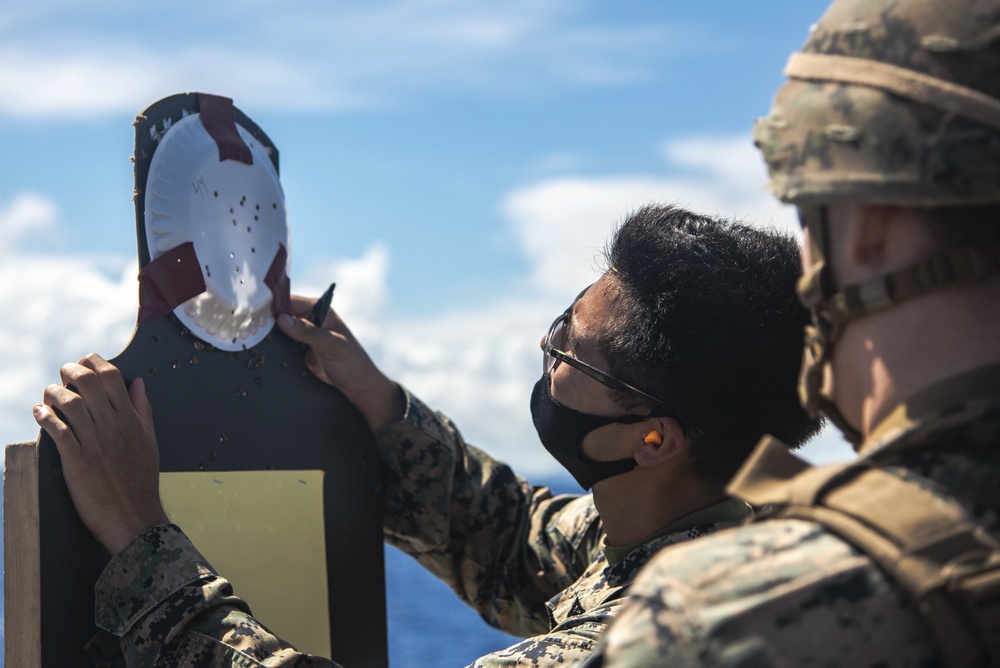 Paddle Battle! Marines and sailors aboard USS New Orleans take place in a marksmanship competition