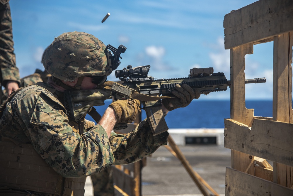 Paddle Battle! Marines and sailors aboard USS New Orleans take place in a marksmanship competition