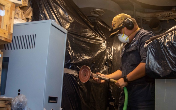 STG 2 Operates Grinder