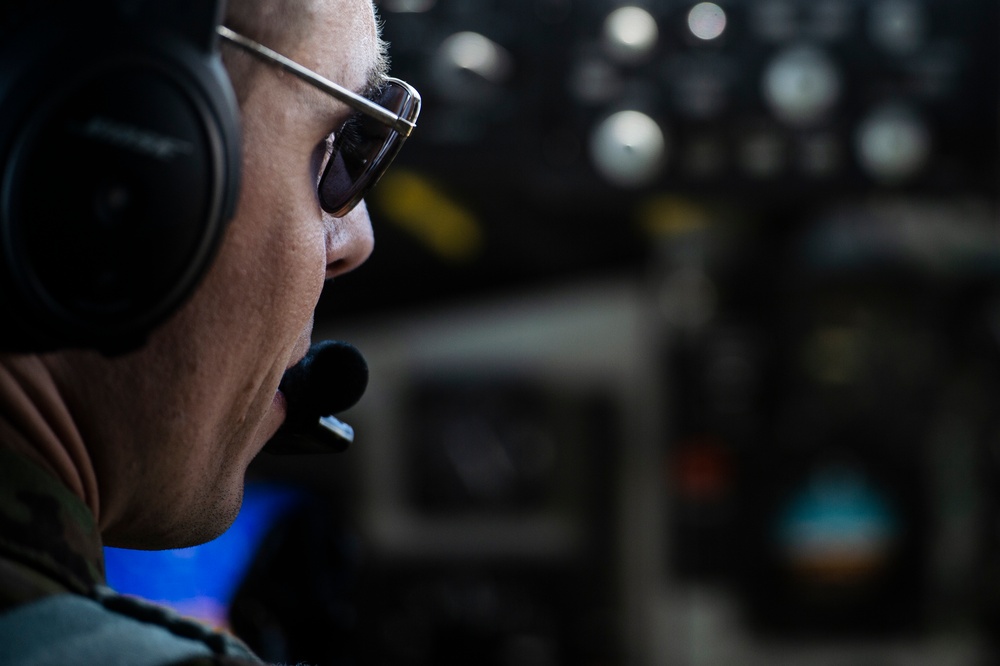 KC-135 Refuels AWACS Over the USCENTCOM AOR
