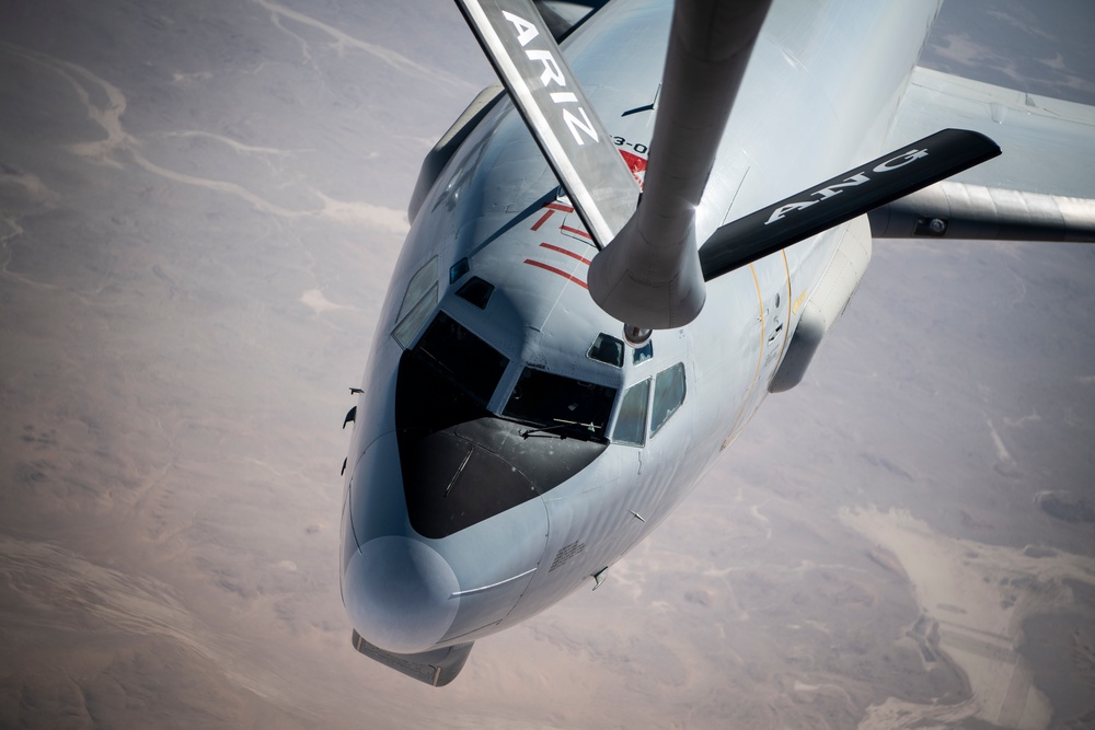 KC-135 Refuels AWACS Over the USCENTCOM AOR