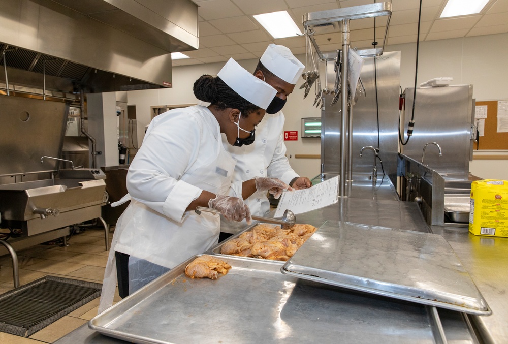 Culinary specialists conduct dining facility operations