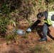 Volunteers with MCB Camp Lejeune clean up trash along Holcomb Blvd.