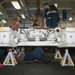 Sailors Perform Maintenance