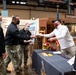 Representatives from Washington Football Team distributed appreciation packages to service members onboard Washington Navy Yard.