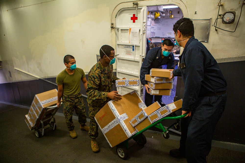 15th MEU DLC receives packages aboard USS Makin Island