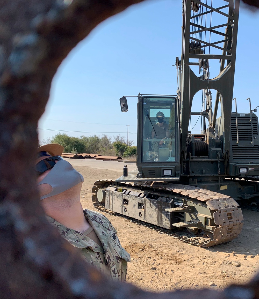 NMCB-5 Practices Pile Driving with 50-ton Crane