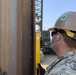 NMCB-5 Practices Pile Driving with 50-ton Crane