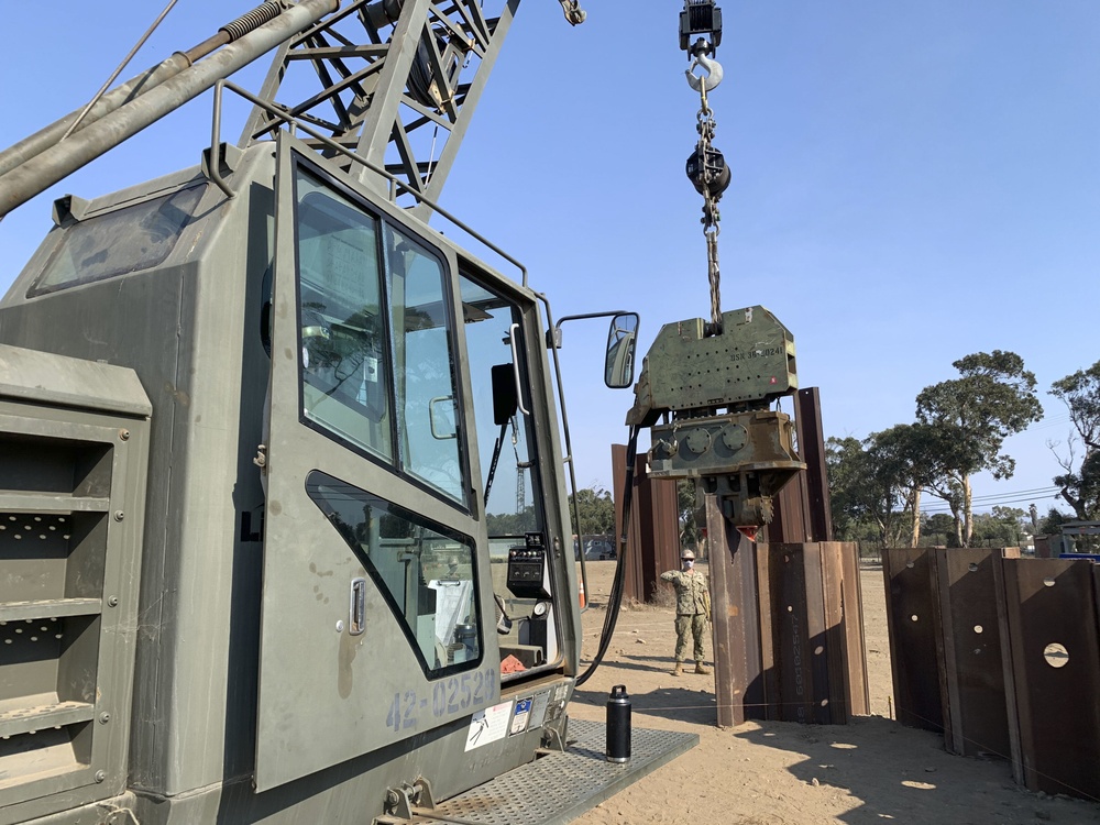 NMCB-5 Practices Pile Driving with 50-ton Crane