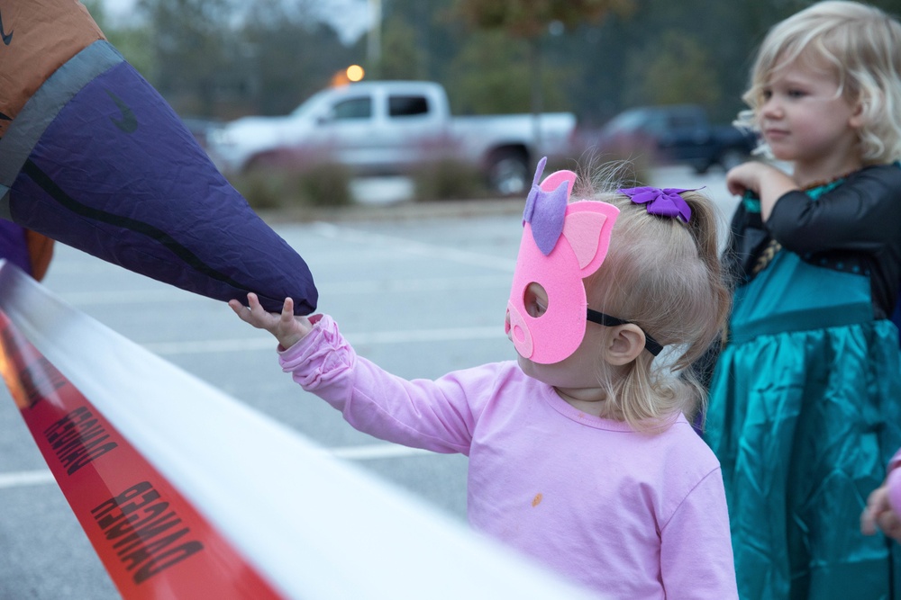 Kids walk through the All American Haunted Lanes Event
