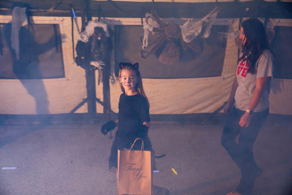 Kids walk through the All American Haunted Lanes Event