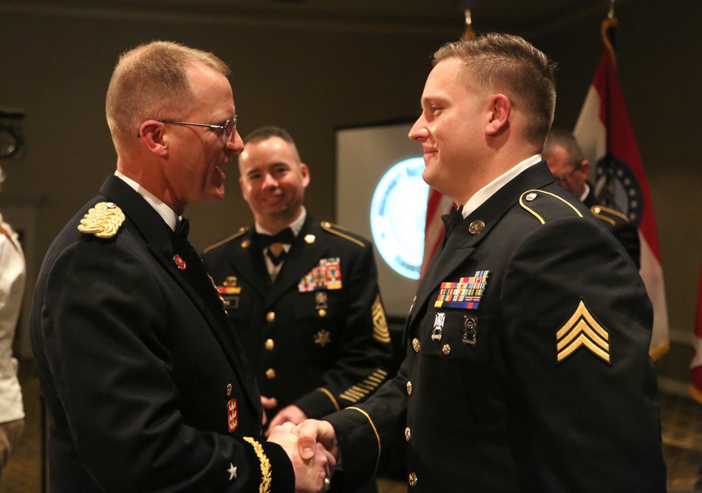 Sgt. Joshua Roth is recognized by The Adjutant General of the Missouri National Guard, Brig. Gen. Levon Cumpton during the National Guard Birthday Ball 2019 (Missouri National Guard photo by Spc. Christopher Saunders).