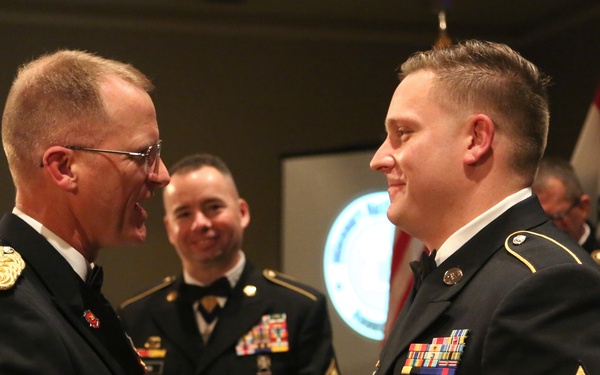 Sgt. Joshua Roth is recognized by The Adjutant General of the Missouri National Guard, Brig. Gen. Levon Cumpton during the National Guard Birthday Ball 2019 (Missouri National Guard photo by Spc. Christopher Saunders).