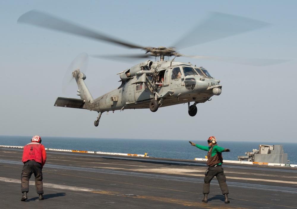 Helicopter Takes Off of Flight Deck