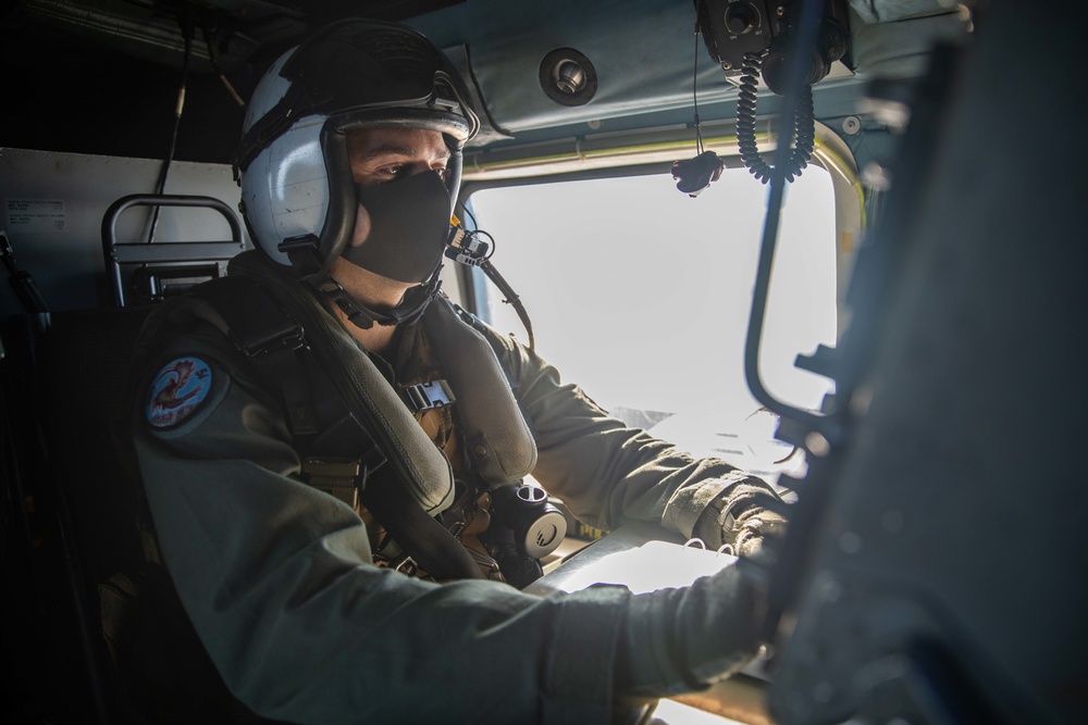 Naval Air Crewman Operates Radar Console Aboard MH-60R