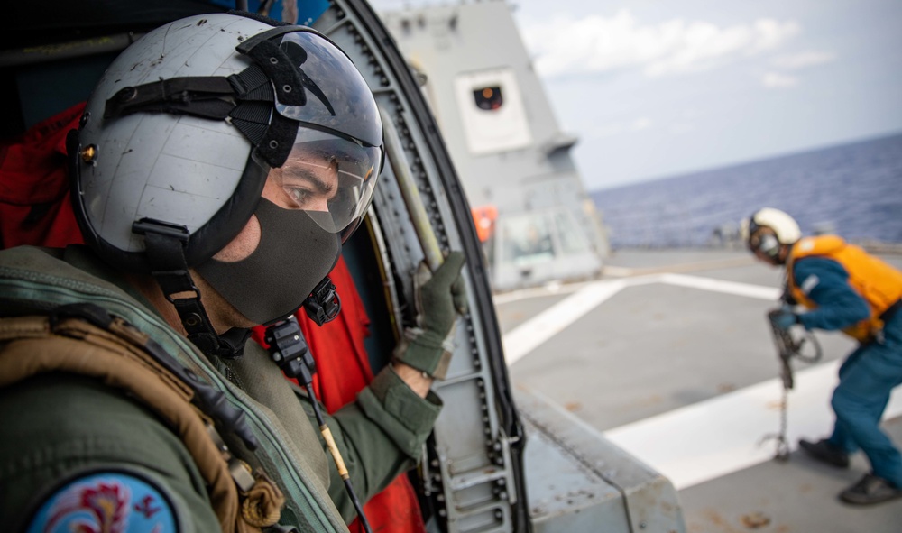 Naval Air Crewman Observes Japanese Sailors