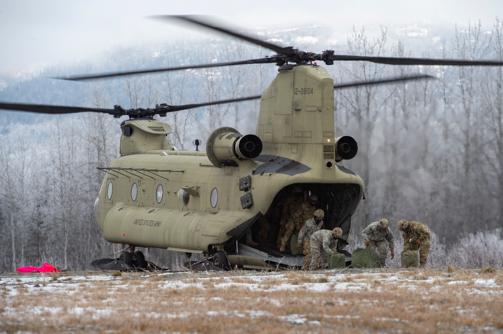 AKARNG aviators and USARAK paratroopers conduct aerial sustainment training at JBER