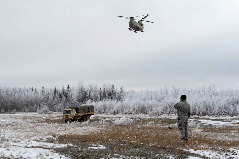 AKARNG aviators and USARAK paratroopers conduct aerial sustainment training at JBER
