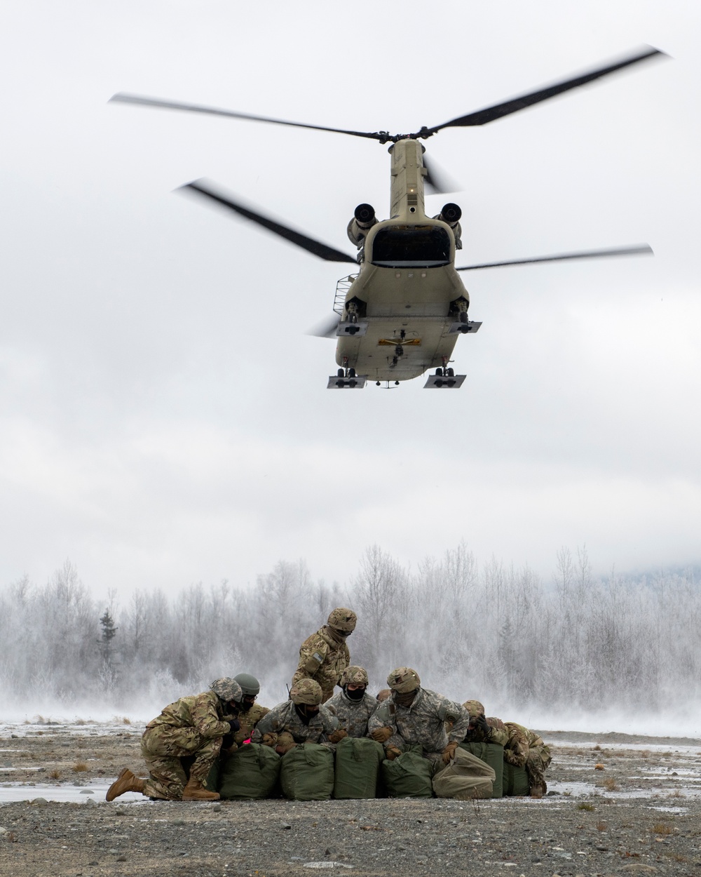 AKARNG aviators and USARAK paratroopers conduct aerial sustainment training at JBER