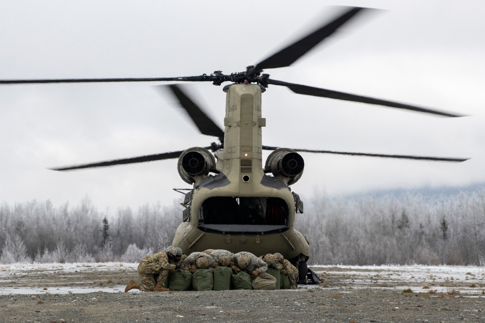AKARNG aviators and USARAK paratroopers conduct aerial sustainment training at JBER