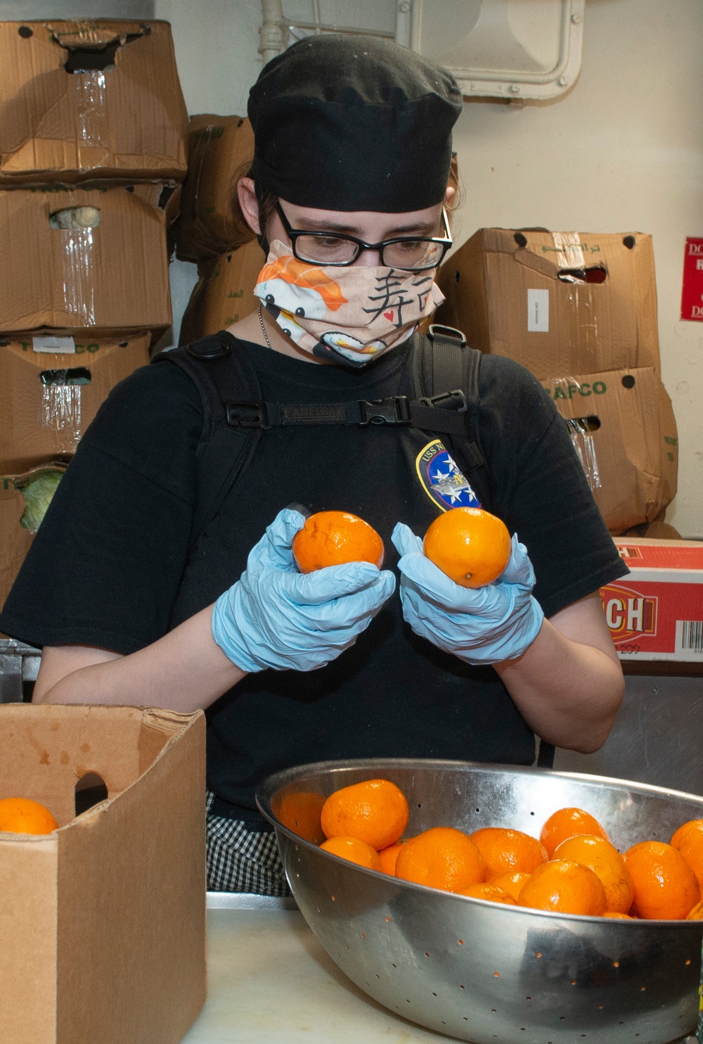 Sailor Inspects Fruit