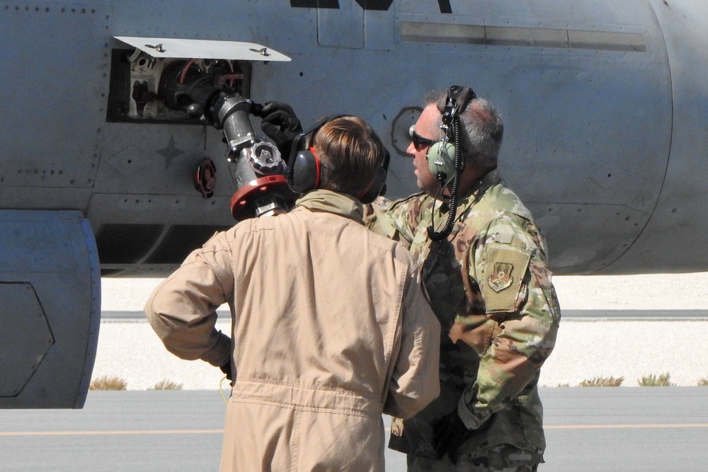 379th AEW Airmen conduct hot refuel