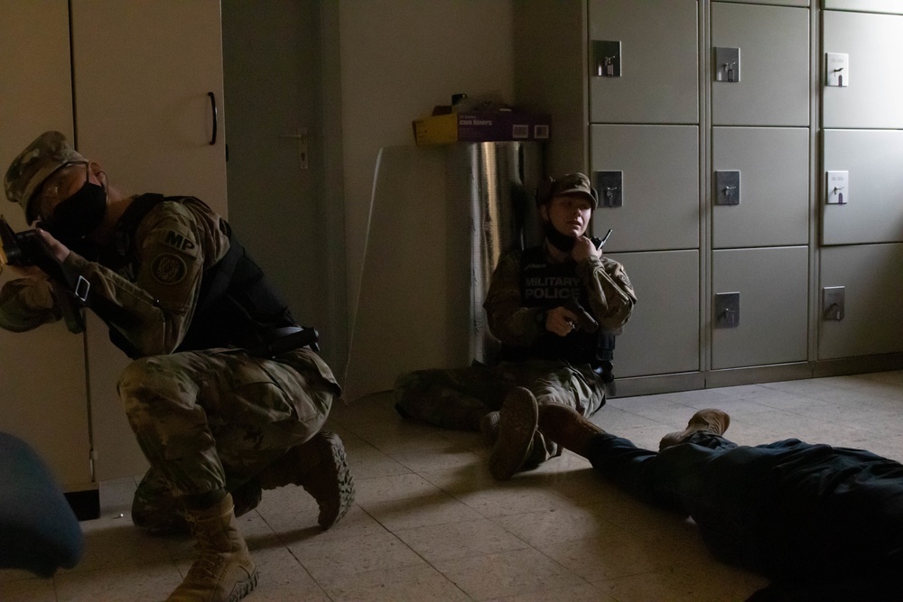 Soldiers clear room during active shooter training