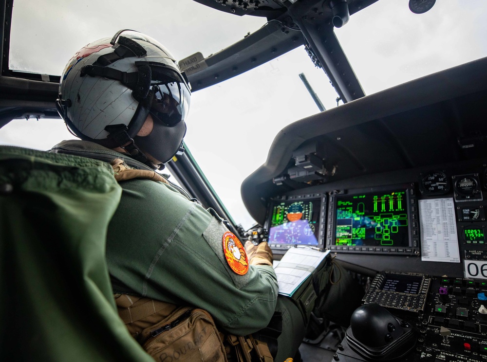 U.S. Navy Pilot Operates MH-60R During Keen Sword 21