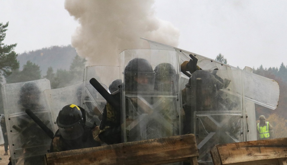 Iowa Soldiers respond to realistic riot scenario at JMRC