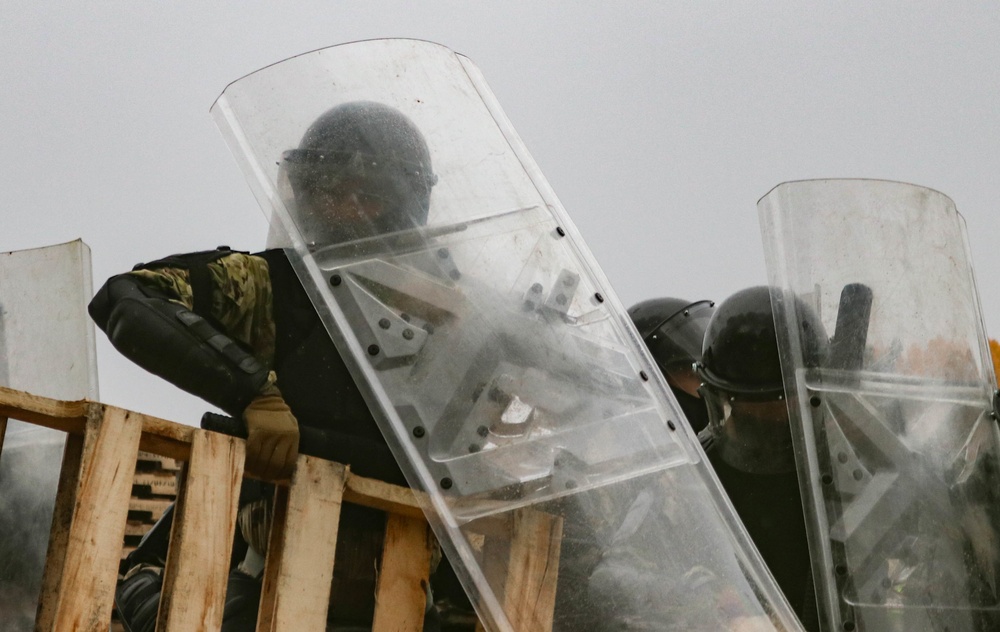 Iowa Soldiers respond to realistic riot scenario at JMRC