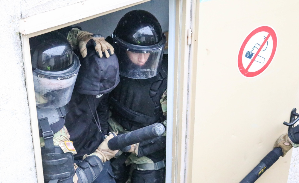 Iowa Soldiers respond to realistic riot scenario at JMRC