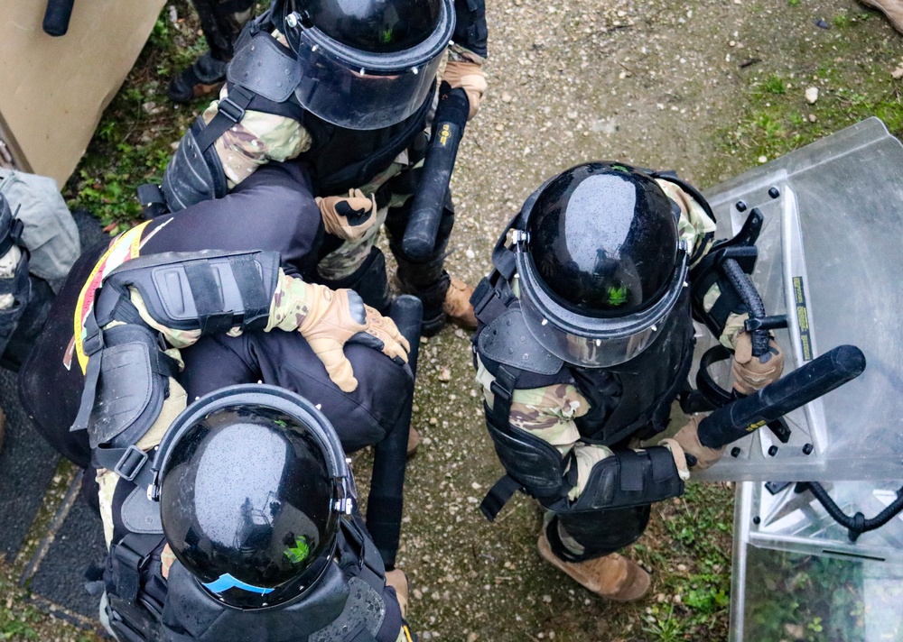 Iowa Soldiers respond to realistic riot scenario at JMRC