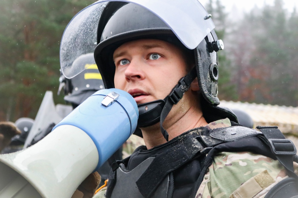 Iowa Soldiers respond to realistic riot scenario at JMRC
