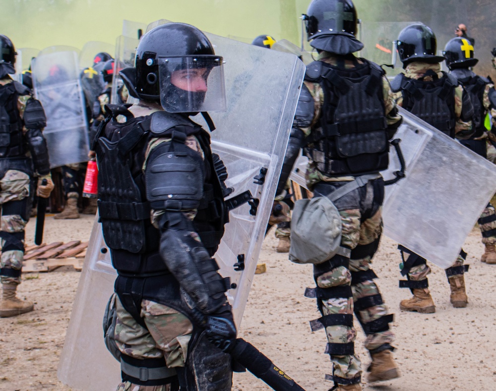 An Iowa Soldier responds to realistic riot scenario at JMRC