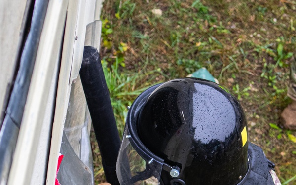 An Iowa Soldier responds to realistic riot scenario at JMRC