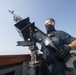 Ralph Johnson conducts gun maintenance