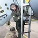 Maintainers, aircrew test in-ear headset during CBRN exercise