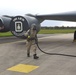 Maintainers, aircrew test in-ear headset during CBRN exercise