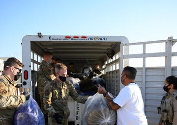 60th Aerial Port Squadron donates pillows and blankets to local shelters