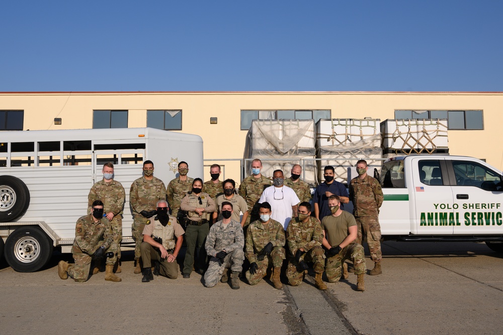 60th Aerial Port Squadron donates pillows and blankets to local shelters