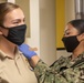 USS Arlington (LPD 24) administers influenza vaccines