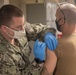 USS Arlington (LPD 24) administers influenza vaccines