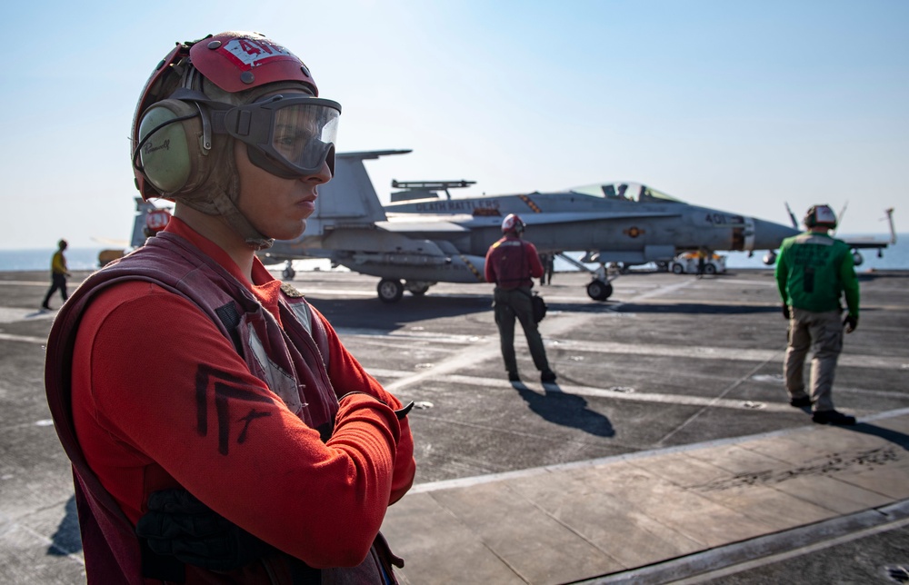 Sailor Observes Flight Operations