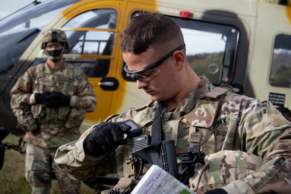 Cavalry scout helps simulate helicopter repair