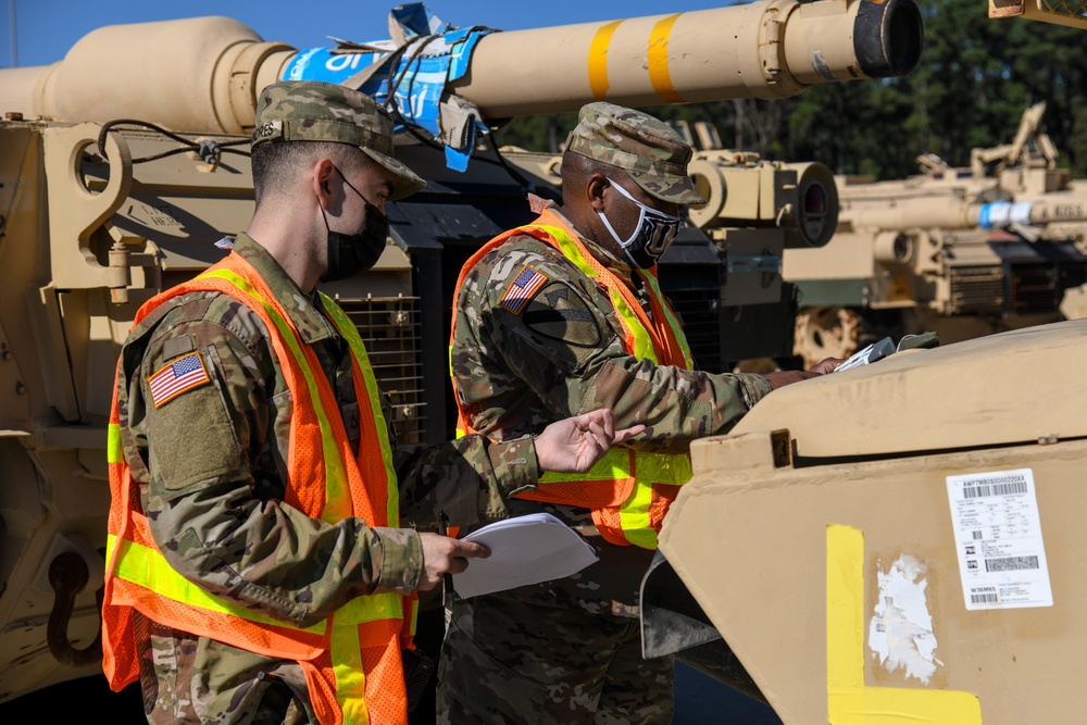 Army soldiers transport cargo for global operations